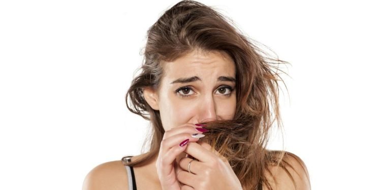 Why Does My Hair Smell Like A Wet Dog After Washing?